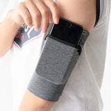 Adjustable Running Phone Holder with Earphone Compartment – Fits Arm Sizes 26-42 cm, Compatible with iPhone and Galaxy